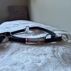American Exchange belt. Excellent condition. Thin with silver elements around